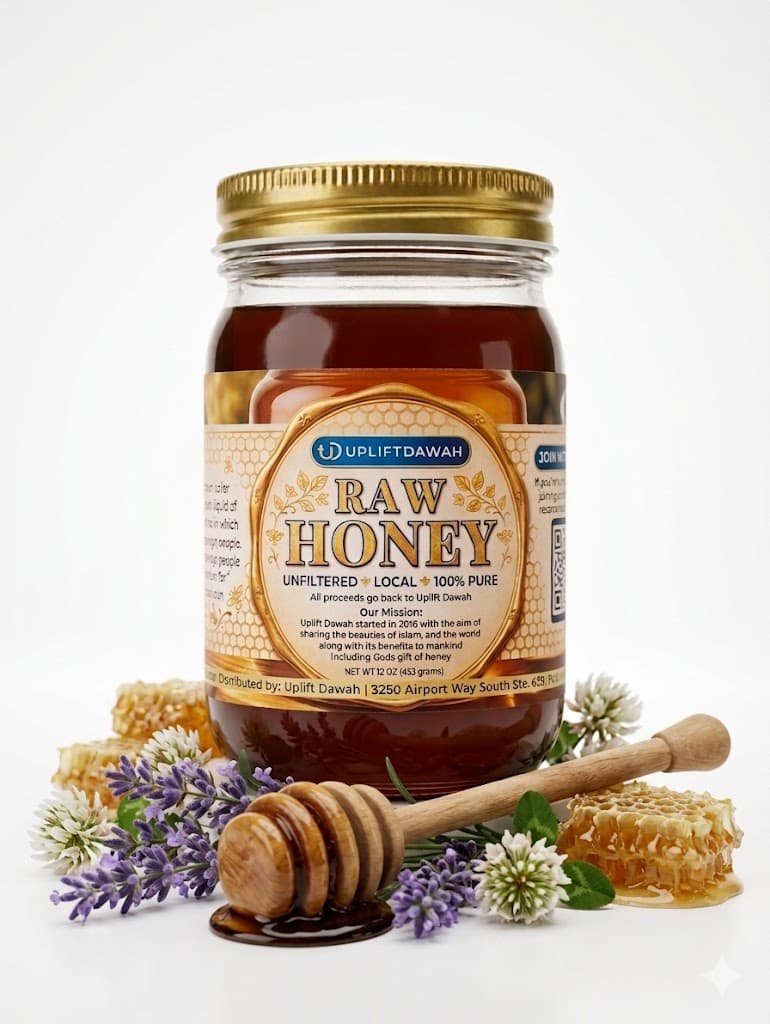 A jar of Uplift Honey styled on a wooden tray